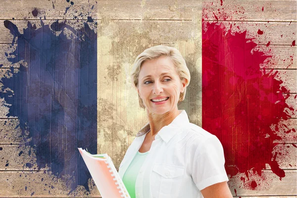 Mature student against france flag — Stock Photo, Image