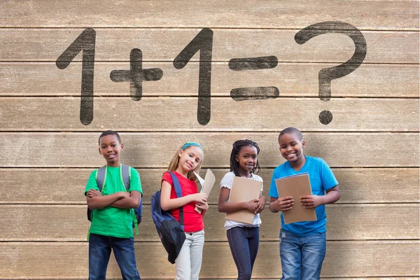 Pupils against wooden surface with planks — Stock Photo, Image