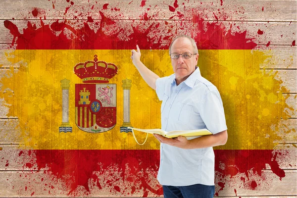 Učitel směřující proti Španělsku vlajky — Stock fotografie