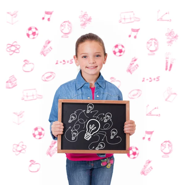 Cute pupil showing chalkboard — Stock Photo, Image