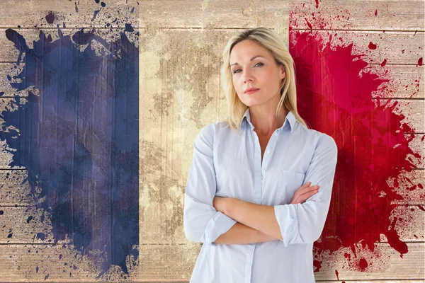 Student frowning against france flag — Stock Photo, Image