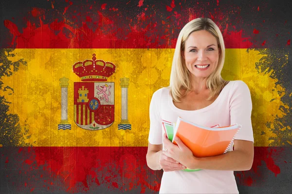 Зрелый студент против испанского флага — стоковое фото