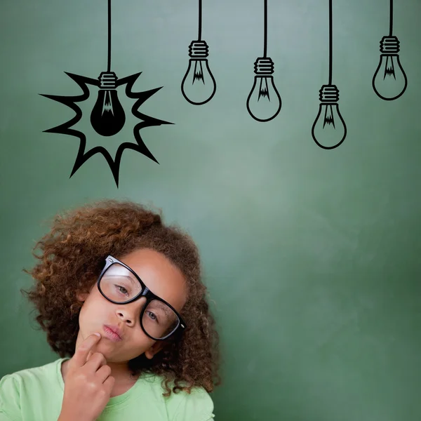 Composite image of cute pupil thinking — Stock Photo, Image