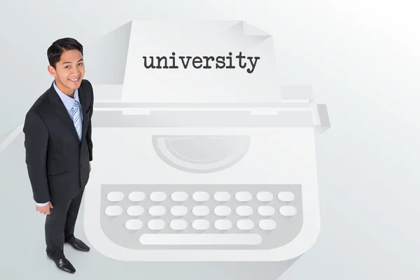 Word університет і азіатський бізнесмен — стокове фото