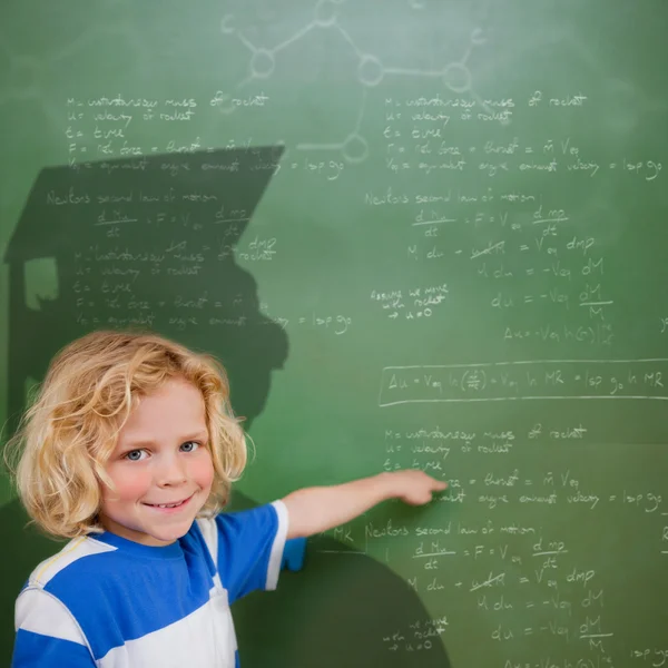 Composite image of cute pupil with graduate outline — Stock Photo, Image