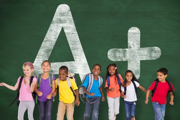 Pupils against chalkboard with a plus grade — Stock Photo, Image