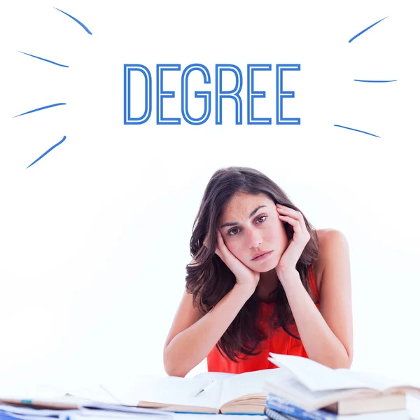 Word degree against stressed student — Stock Photo, Image