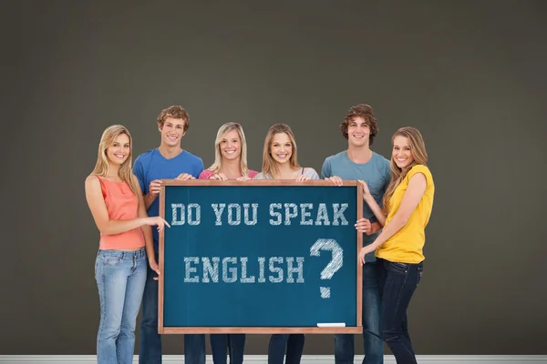 Group of people holding blackboard — Stock Photo, Image