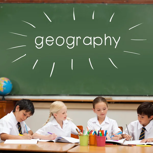 Word geography against cute pupils — Stock Photo, Image