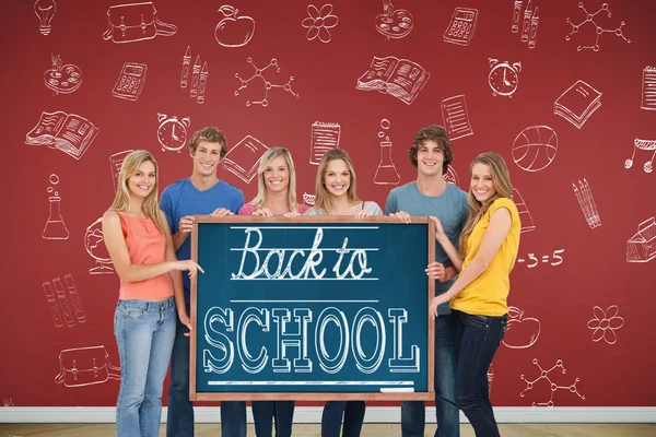 Groep mensen houden schoolbord — Stockfoto
