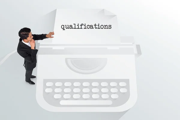 Word qualifications and asian businessman — Stock Photo, Image