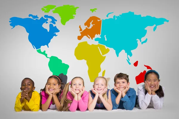 Cute pupils with world map — Stock Photo, Image