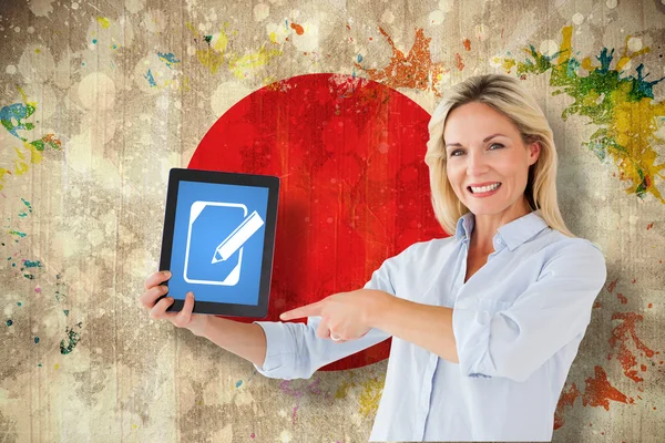 Mature student pointing to tablet — Stock Photo, Image