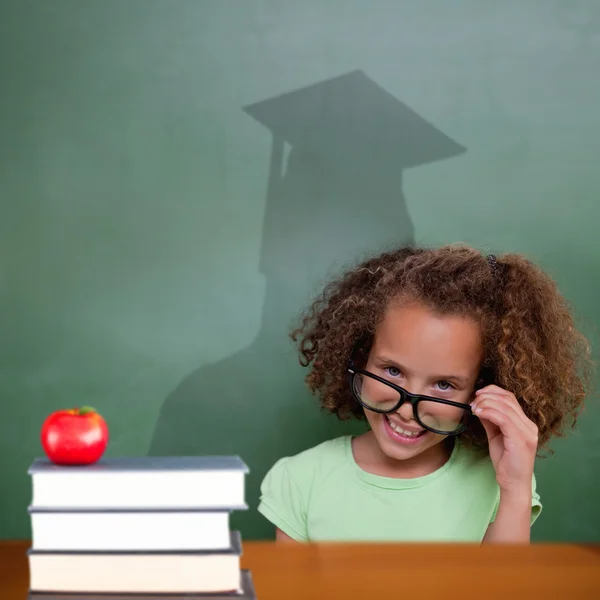 Pupil with graduate shadow in classroom — Stock Photo, Image