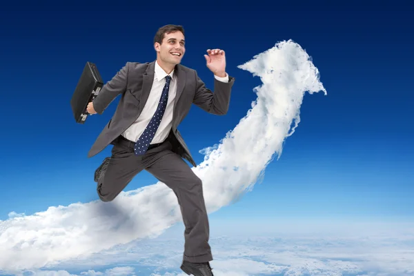 Cheerful businessman with briefcase — Stock Photo, Image