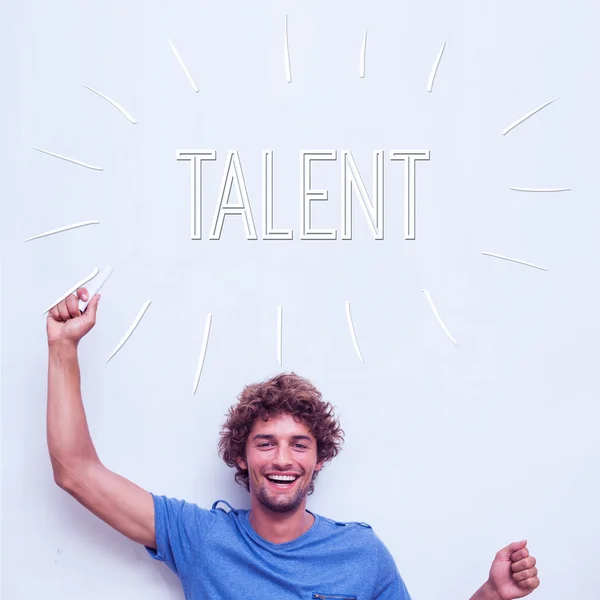 Talent against happy student holding chalk — Stock Photo, Image