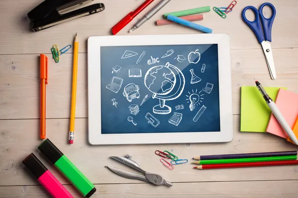 Digital tablet on students desk — Stock Photo, Image