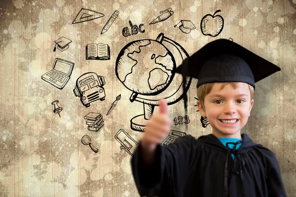 Cute pupil in graduation robe — Stock Photo, Image