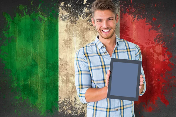 Student showing tablet against italy flag — Stock Photo, Image