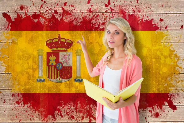 Estudante apontando contra bandeira espanha — Fotografia de Stock