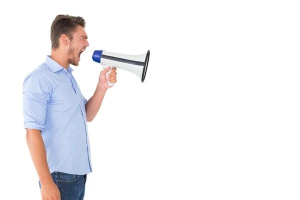 Homem irritado gritando através de megafone — Fotografia de Stock