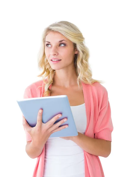 Pretty young blonde using her tablet pc — Stock Photo, Image