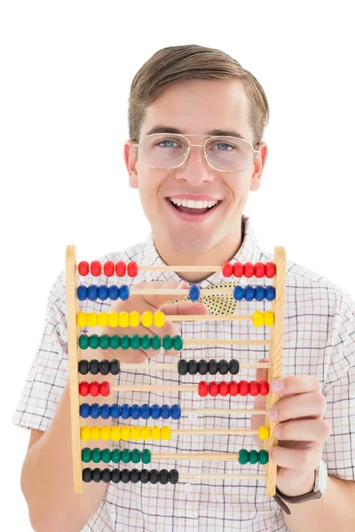 Nerdy hipster adding on abacus — Stock Photo, Image