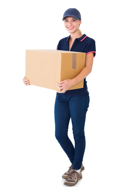 Happy delivery woman holding cardboard box — Stock Photo, Image