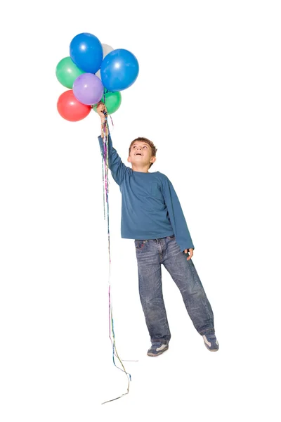 Un piccolo ragazzo con in mano un mucchio di palloncini — Foto Stock