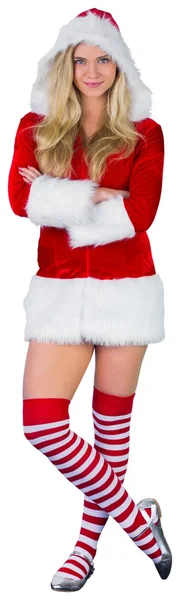 Mooi meisje in santa outfit met gekruiste armen — Stockfoto