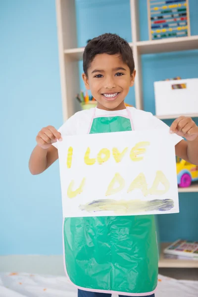 Boy showing his painting in classroom — Stock Photo, Image