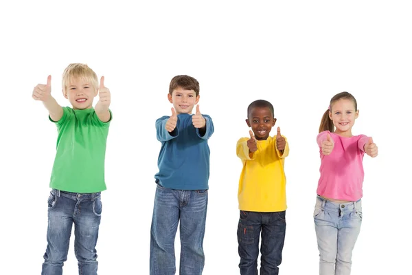 Дети показывают большие пальцы вверх — стоковое фото
