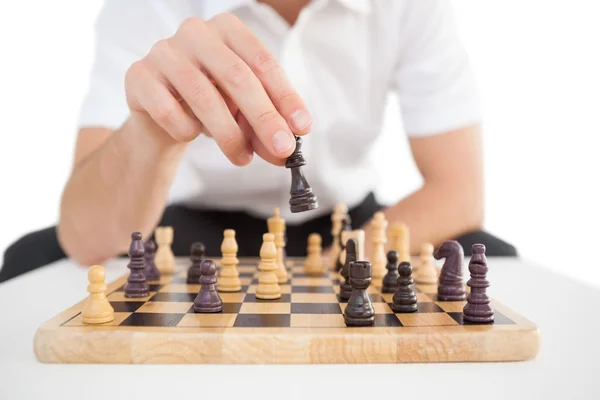 Focused businessman playing chess solo — Stock Photo, Image