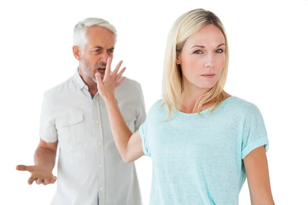 Woman not listening to her angry partner — Stock Photo, Image