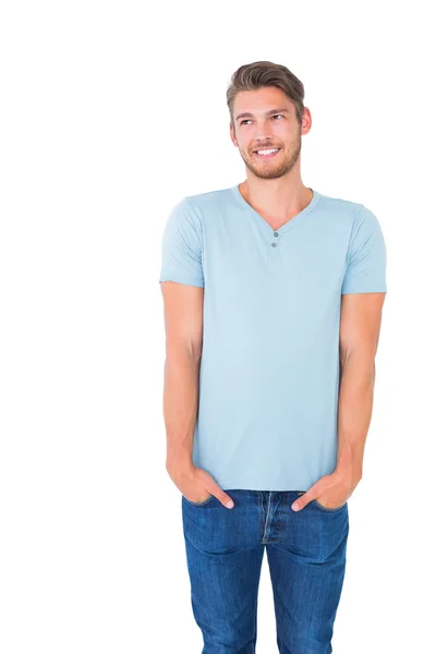 Young man posing with hands in pockets — Stock Photo, Image