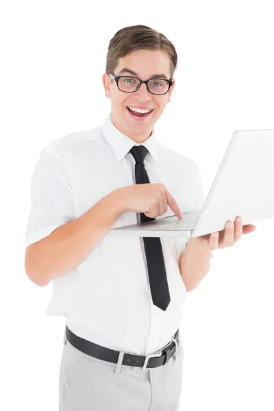 Nerdy affärsman håller sin laptop — Stockfoto