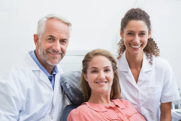 Dentist his assistant and patient — Stock Photo, Image