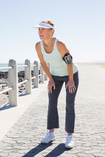 Fit mature woman standing on the pier — Stock Photo, Image