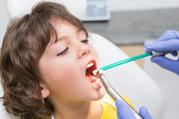 Dentist examining boys teeth — Stock Photo, Image
