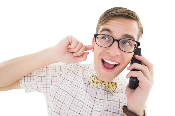 Nerdy hipster talking on retro phone — Stock Photo, Image