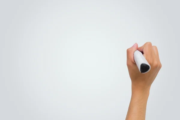Γυναικείο χέρι γράφοντας με δείκτη — Φωτογραφία Αρχείου