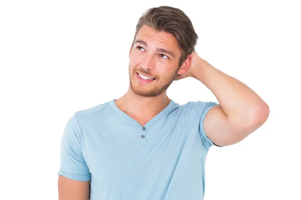 Young man posing with hands on head — Stock Photo, Image