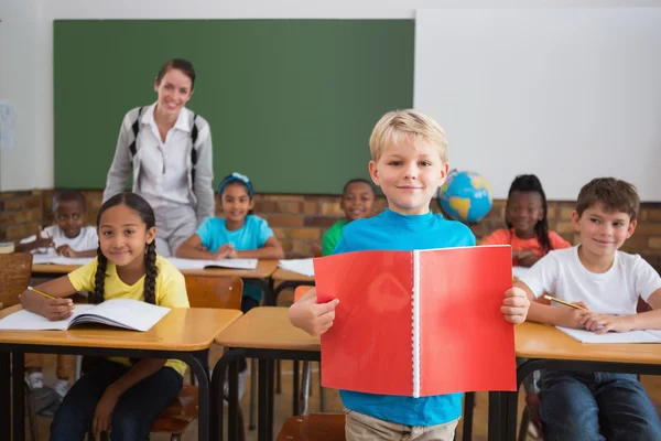 Pupils smiling in classroom — Stock Photo, Image