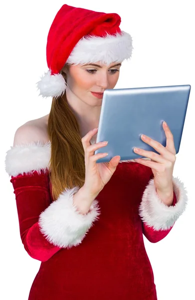 Pretty santa girl using tablet pc — Stock Photo, Image