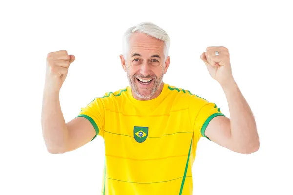 Jásající brazilský fotbalový fanoušek v žlutá — Stock fotografie