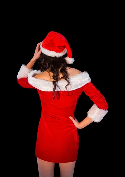 Tänkande brunett i santa outfit — Stockfoto