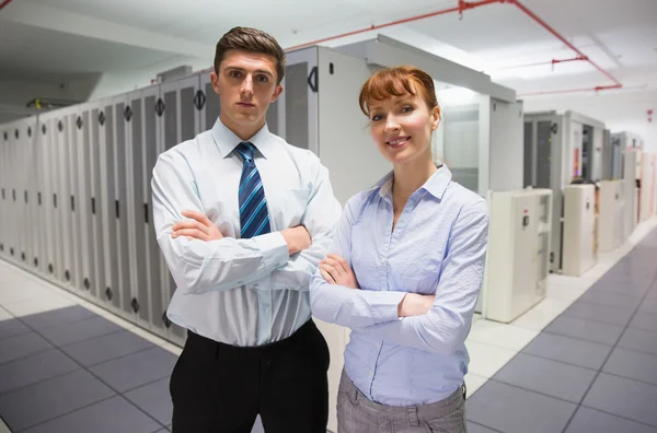 Confident data technicians looking at camera — Stock Photo, Image