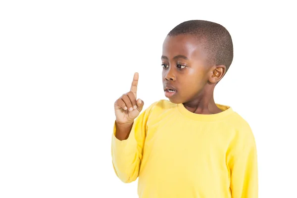 Surprised little boy pointing up — Stock Photo, Image