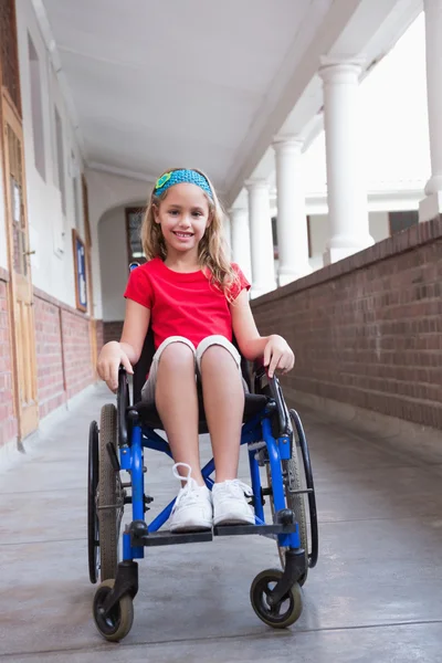 Cute disabled pupil in hall — Stock Photo, Image