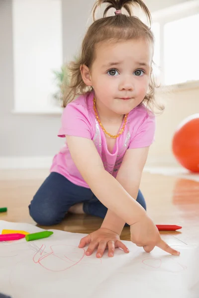 Little girl drawing in living room — Stock Photo, Image